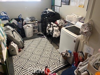 1127 West 23rd Street Merced, CA 95340 - Photo 11 of 14 a bed room with a bed and a television