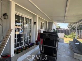 1127 West 23rd Street Merced, CA 95340 - Photo 12 of 14 a view of a patio with table and chairs and potted plants