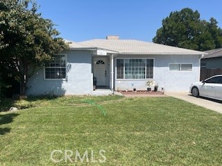 1127 West 23rd Street Merced, CA 95340 - Photo 2 of 14 a view of a house with backyard