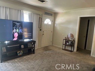 1127 West 23rd Street Merced, CA 95340 - Photo 3 of 14 a view of an empty room with window and closet