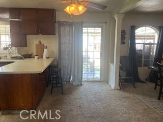 1127 West 23rd Street Merced, CA 95340 - Photo 4 of 14 a room with furniture and window