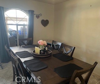 1127 West 23rd Street Merced, CA 95340 - Photo 6 of 14 a dining room with furniture and window