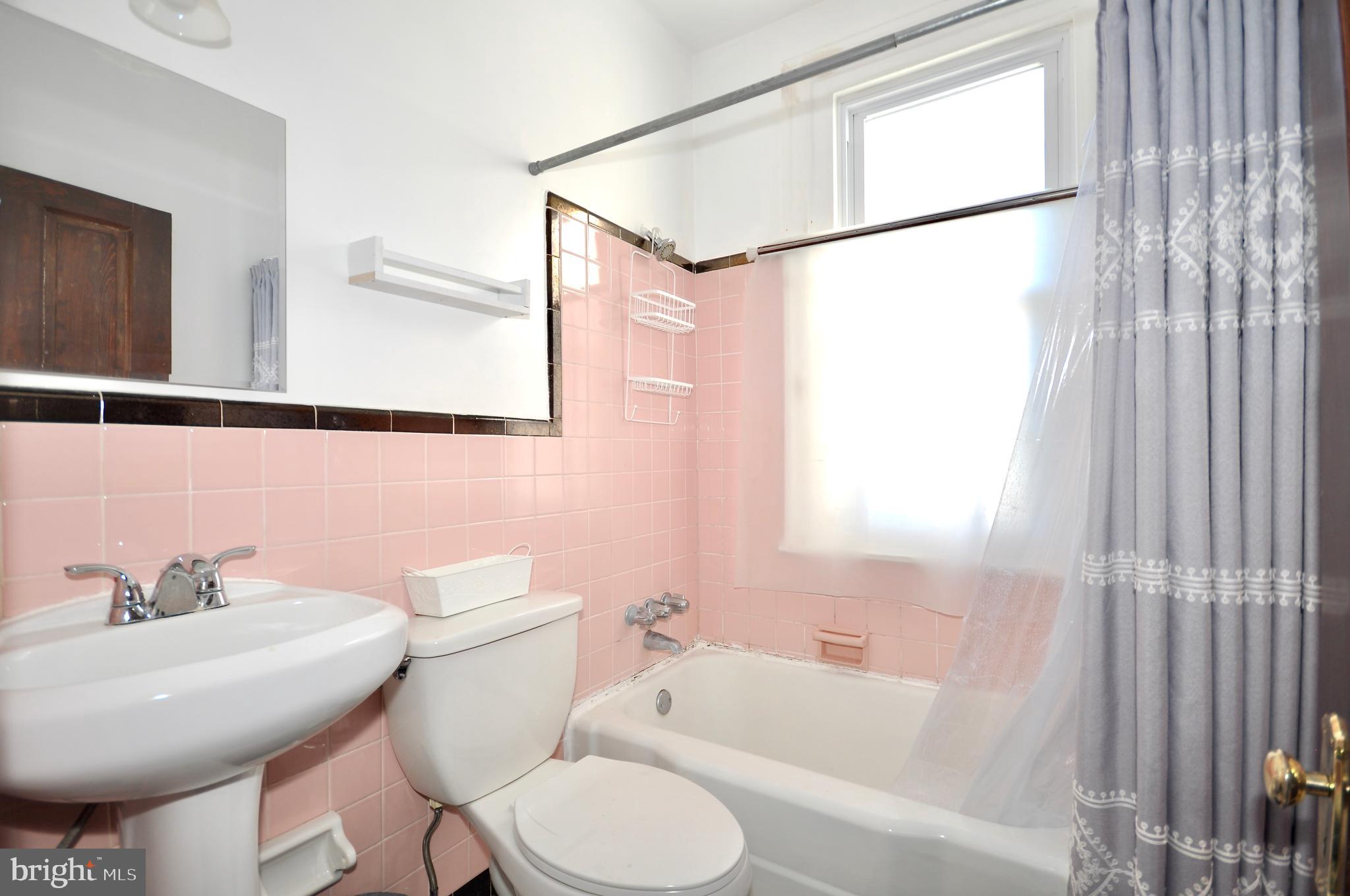 223 Ryers Avenue Cheltenham, PA 19012 - Photo 13 of 25 a bathroom with a sink toilet and shower