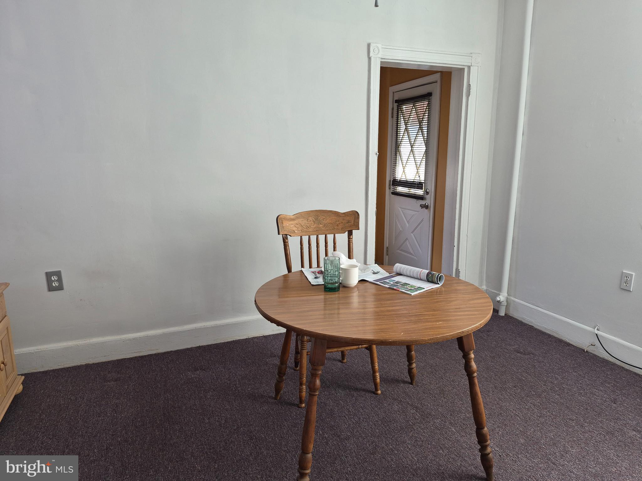 223 Ryers Avenue Cheltenham, PA 19012 - Photo 15 of 25 a view of a room that has a table and chair