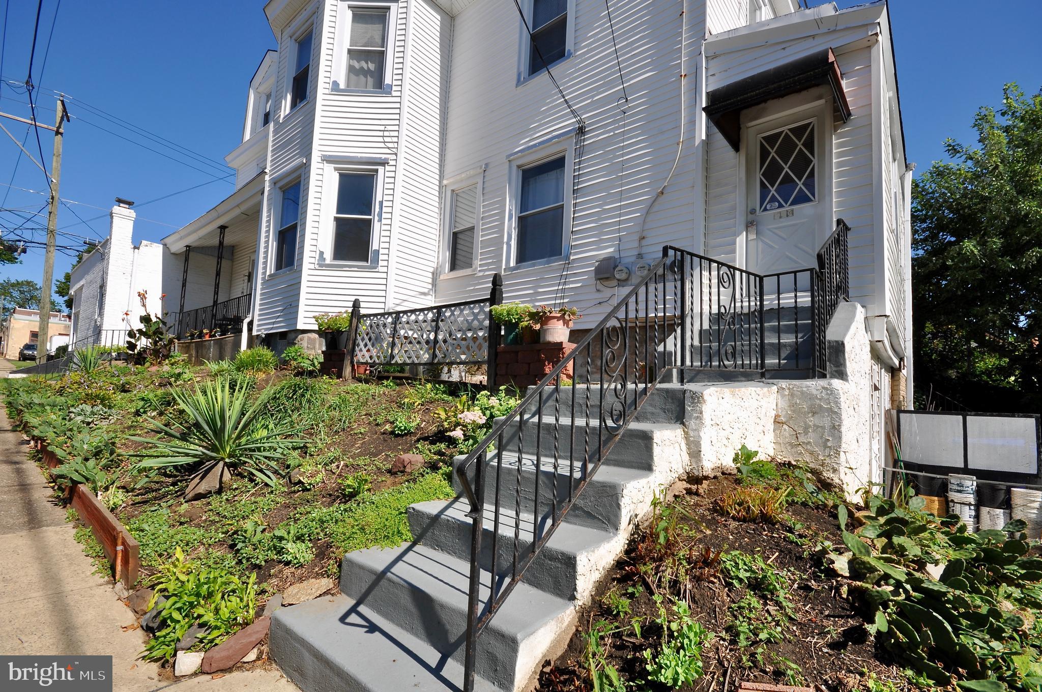 223 Ryers Avenue Cheltenham, PA 19012 - Photo 20 of 25 a view of a patio with table and chairs potted plants