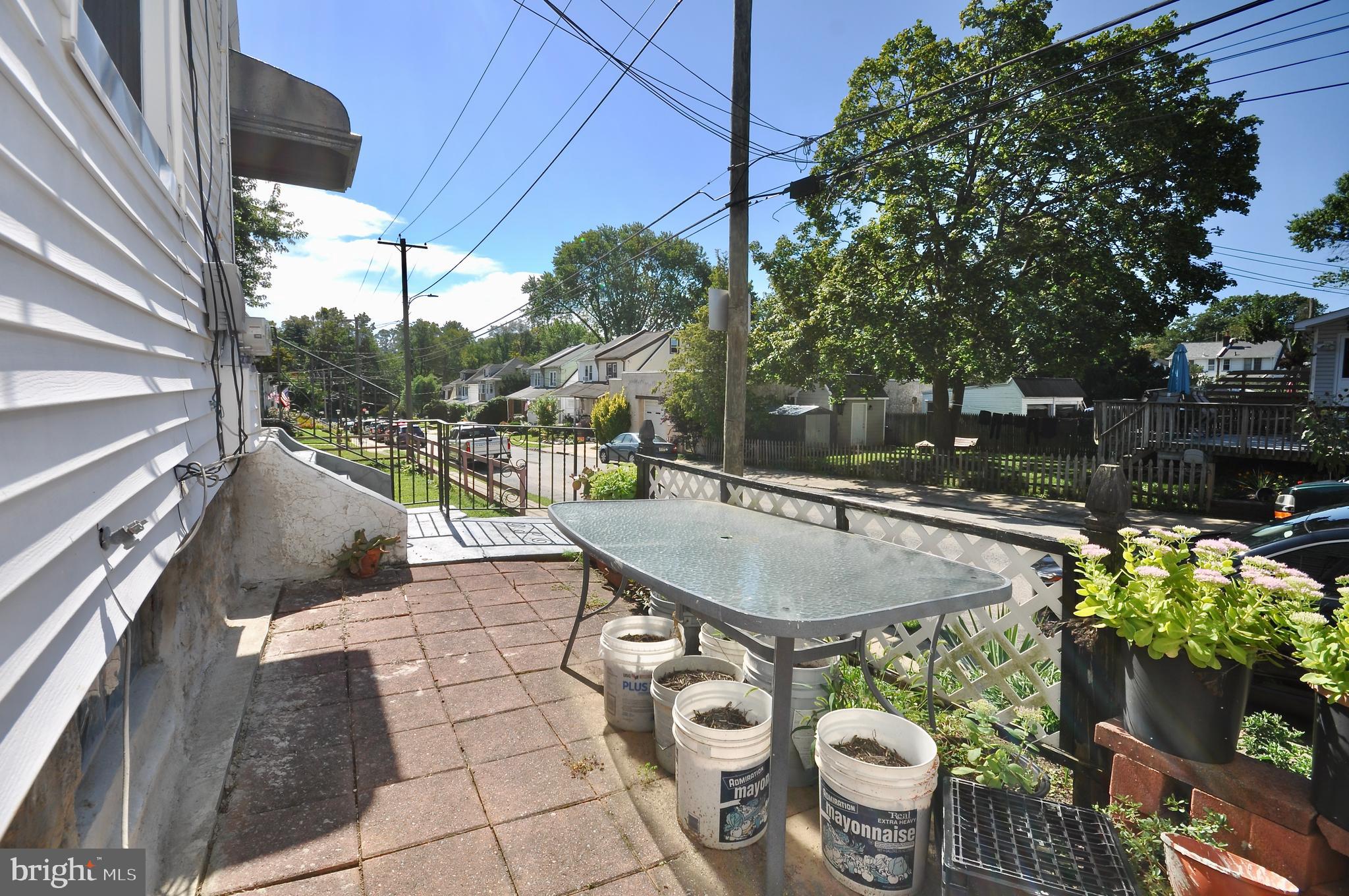 223 Ryers Avenue Cheltenham, PA 19012 - Photo 22 of 25 a terrace with outdoor seating and city view