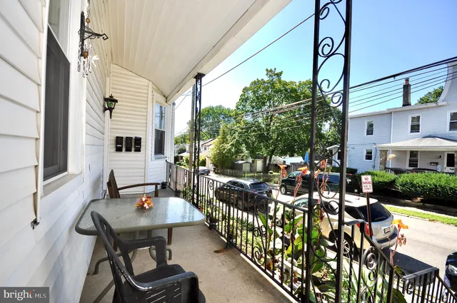 a view of a patio with chairs and table in a patio