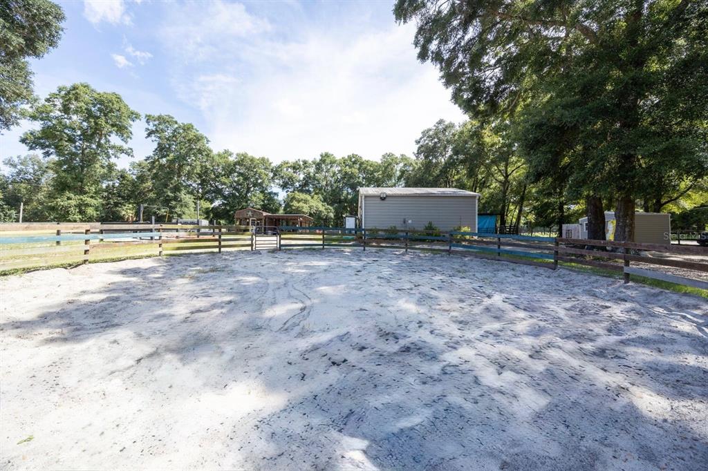 9106 Southwest 124 Street Archer, FL 32618 - Photo 24 of 57 a view of a outdoor space with trees
