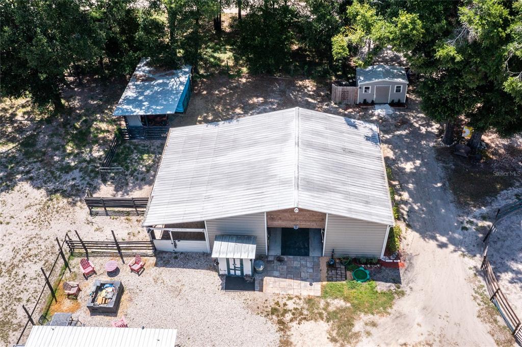 9106 Southwest 124 Street Archer, FL 32618 - Photo 48 of 57 a backyard of a house with seating space