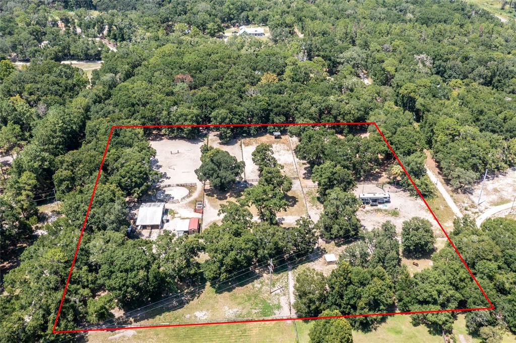 9106 Southwest 124 Street Archer, FL 32618 - Photo 54 of 57 an aerial view of residential houses with outdoor space and trees all around