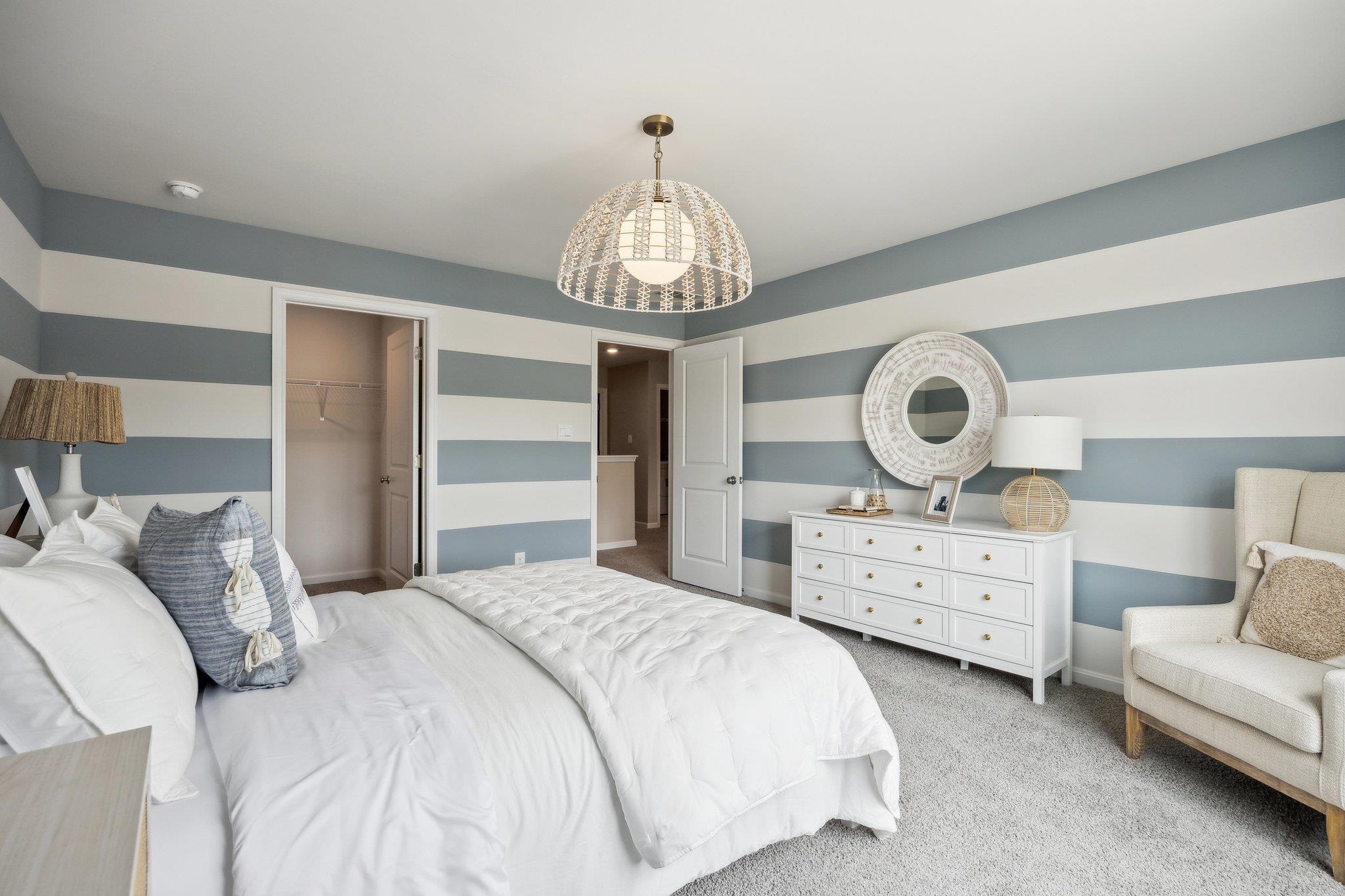 490 Rachel Drive Penn Laird, VA 22846 - Photo 20 of 30 a bedroom with bed and a chandelier