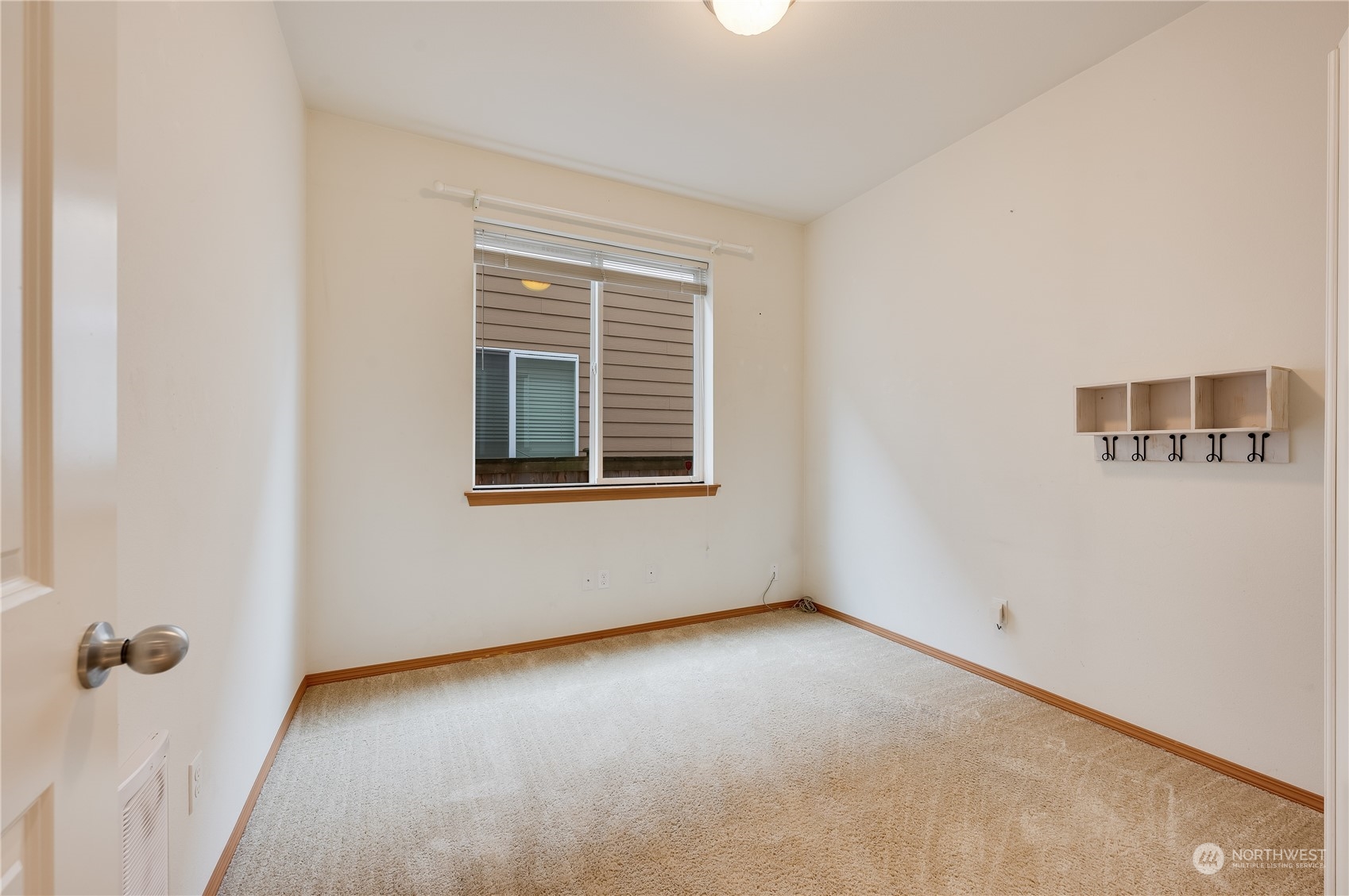 1321 173 Place Southeast Bothell, WA 98012 - Photo 13 of 25 a view of an empty room with a window