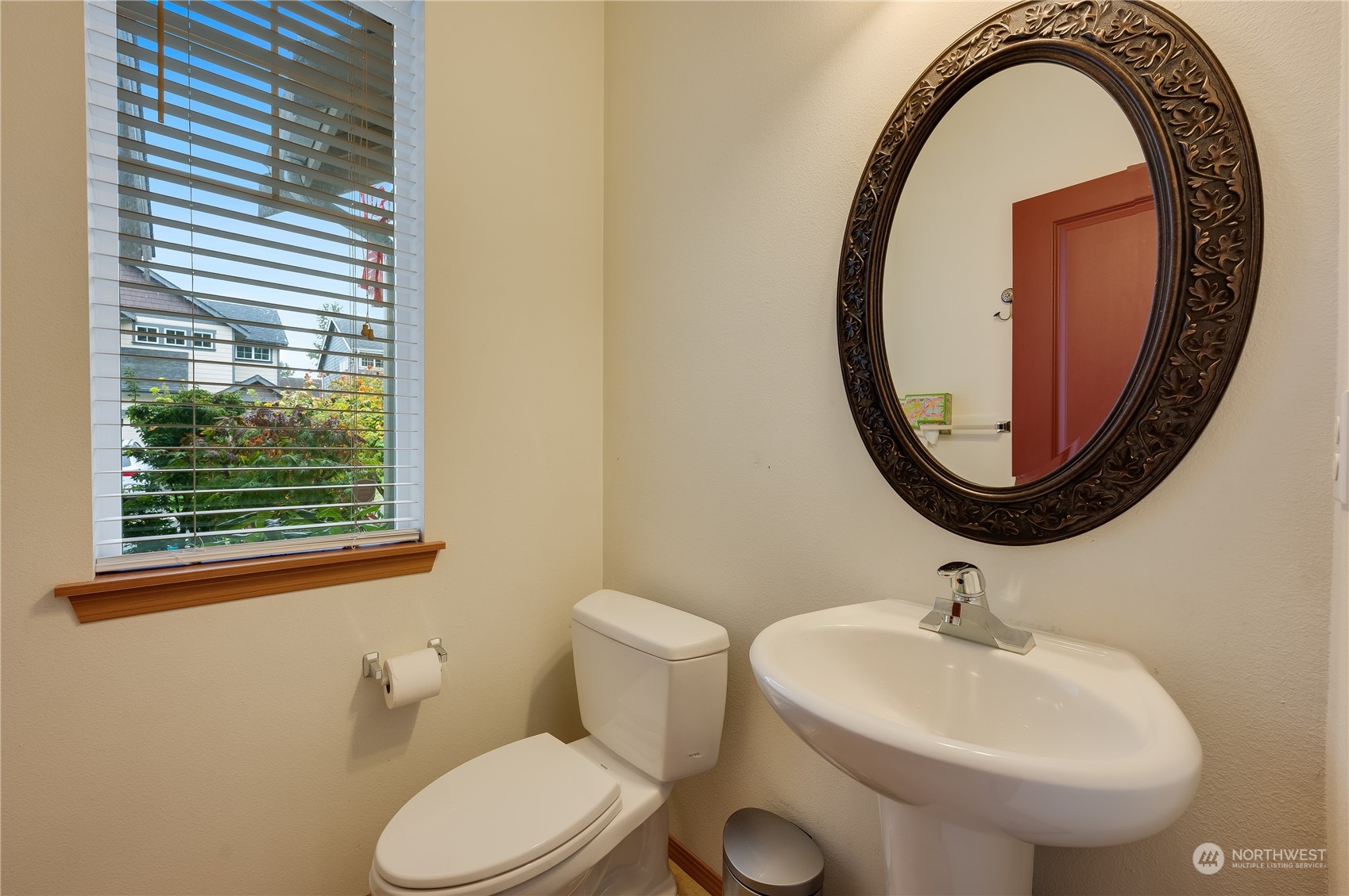 1321 173 Place Southeast Bothell, WA 98012 - Photo 14 of 25 a bathroom with a sink and a mirror