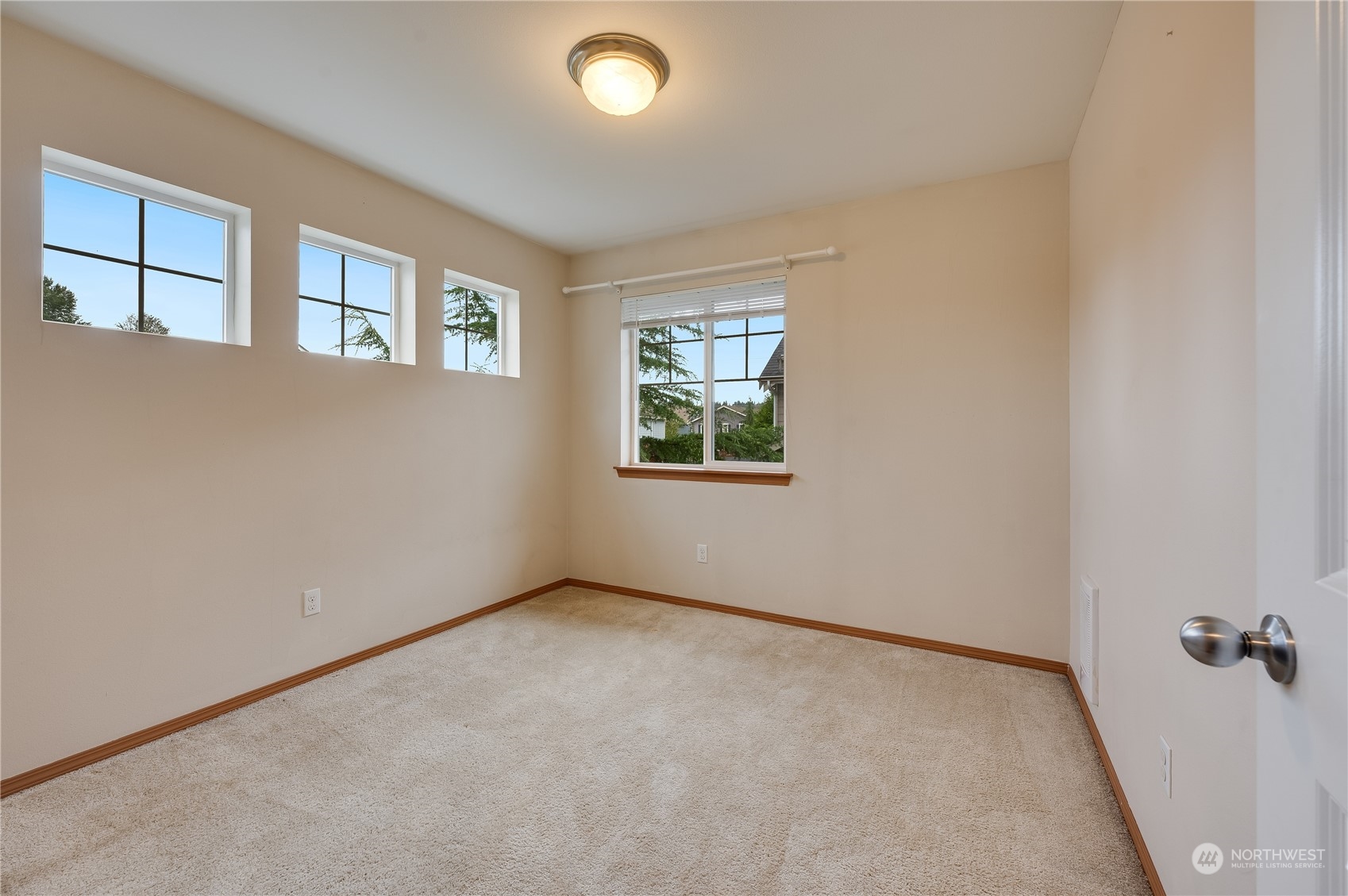 1321 173 Place Southeast Bothell, WA 98012 - Photo 20 of 25 an empty room with windows