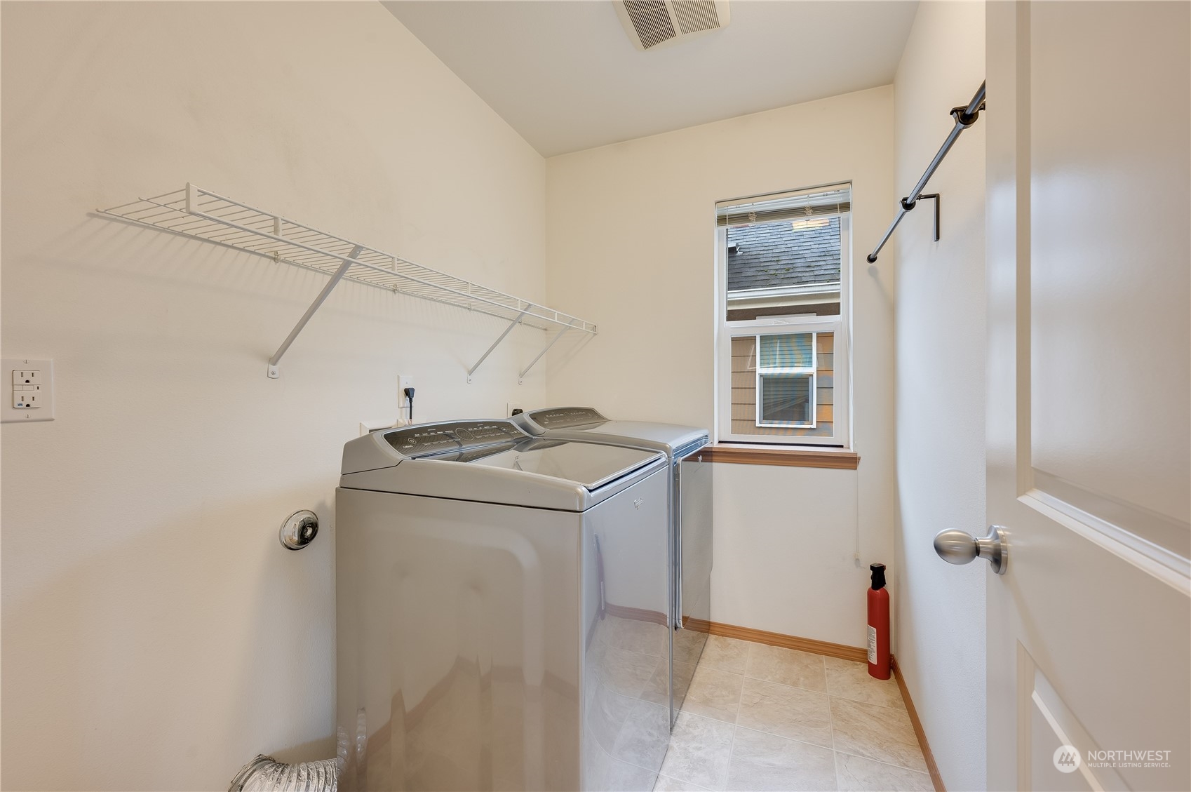 1321 173 Place Southeast Bothell, WA 98012 - Photo 22 of 25 a utility room with dryer and washer
