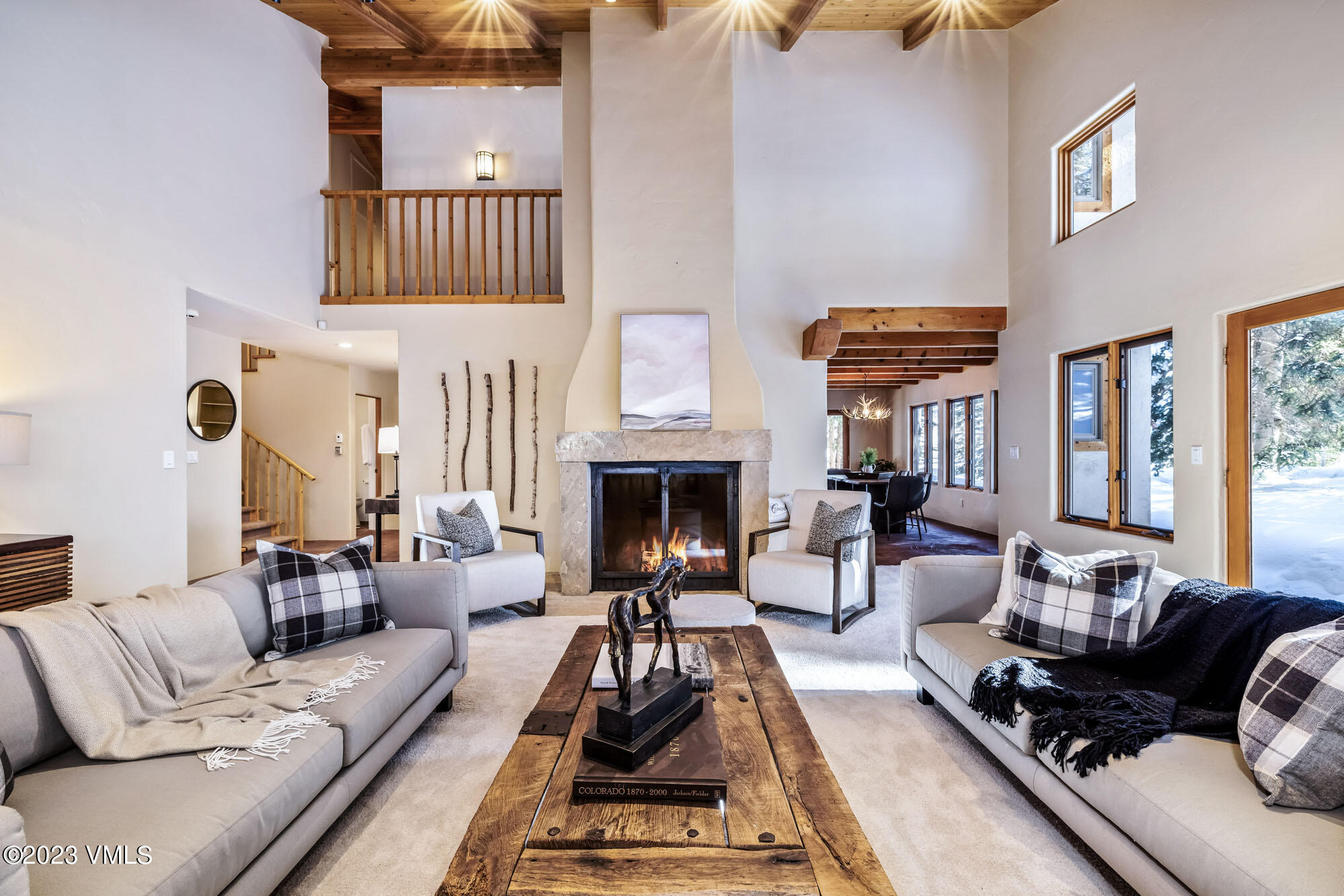 25 Casteel Creek Road Edwards, CO 81632 - Photo 1 of 87 a living room with furniture or couch and a fireplace