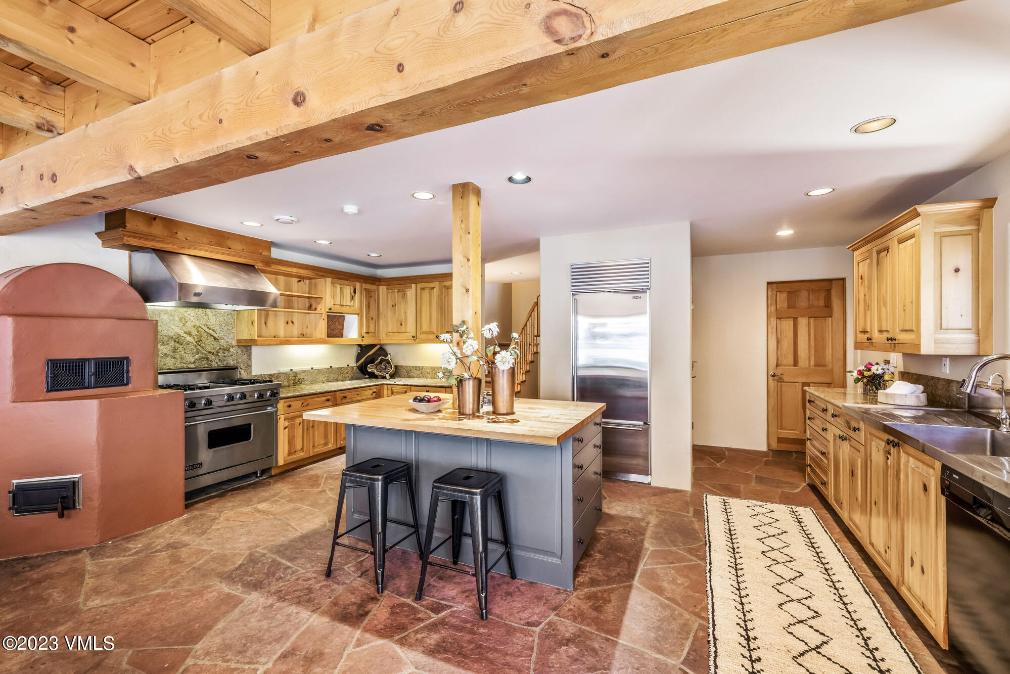 25 Casteel Creek Road Edwards, CO 81632 - Photo 16 of 87 a kitchen with kitchen island granite countertop lots of counter top space and stainless steel appliances