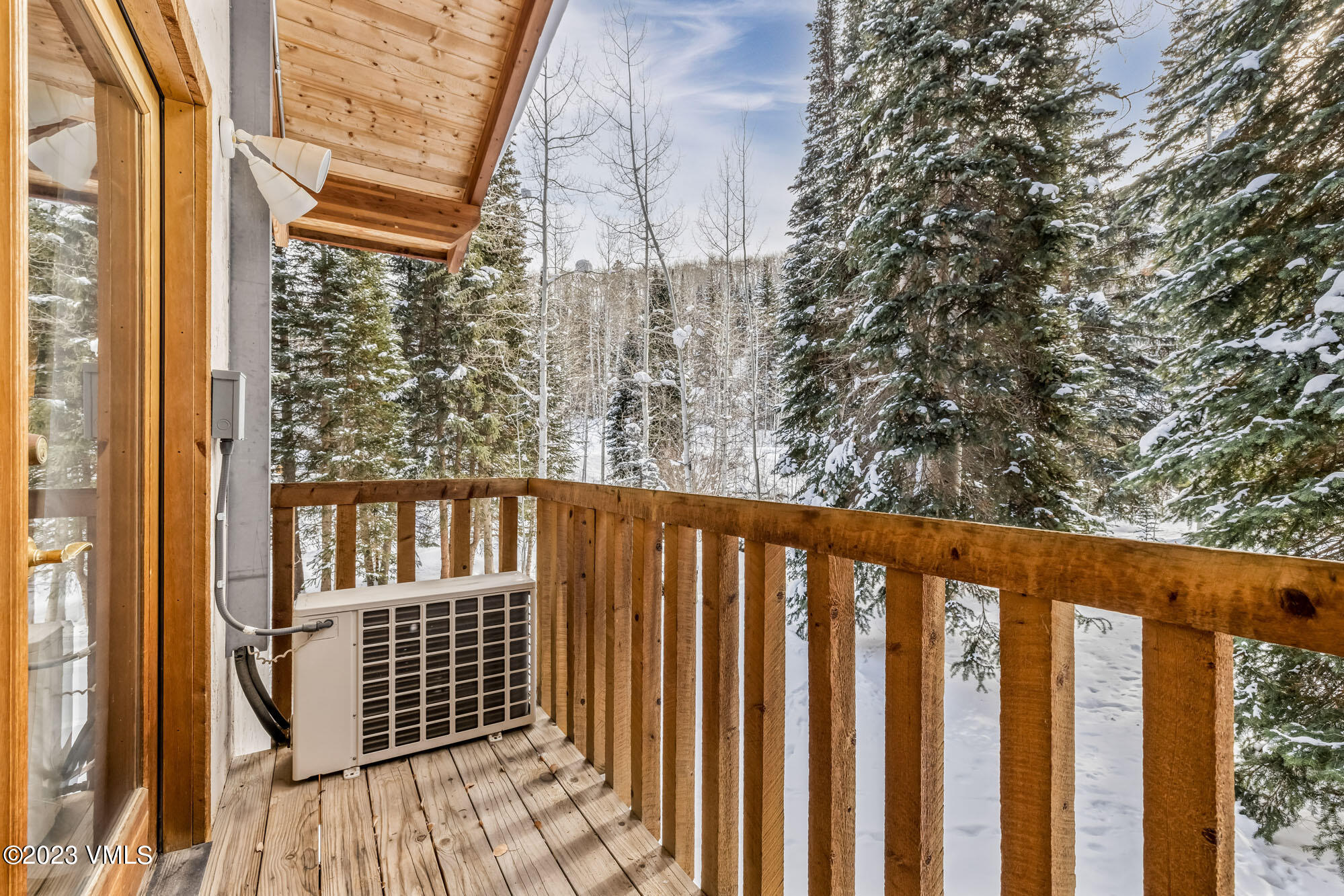25 Casteel Creek Road Edwards, CO 81632 - Photo 27 of 87 a view of a balcony with wooden floor and fence