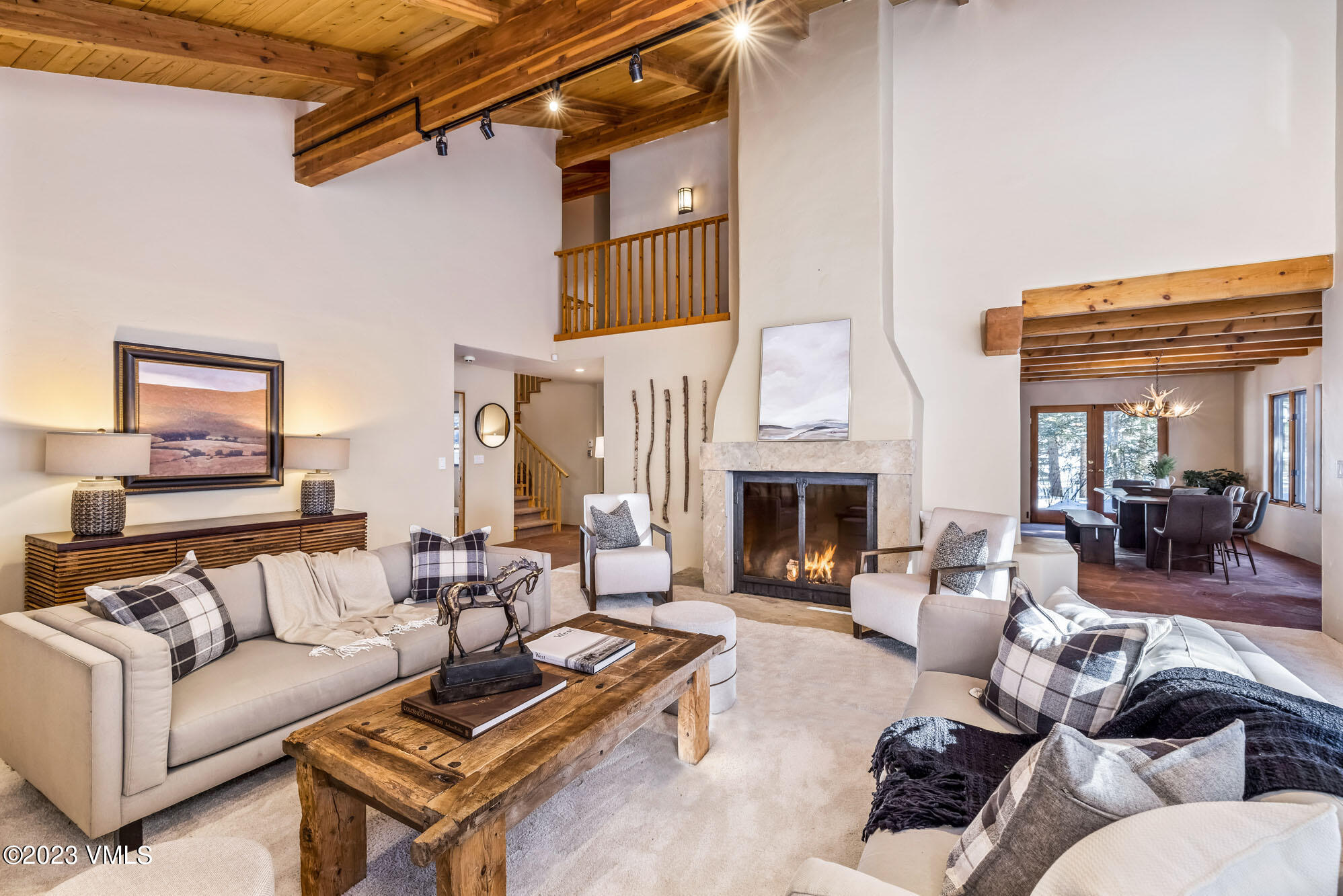 25 Casteel Creek Road Edwards, CO 81632 - Photo 4 of 87 a living room with furniture and a fireplace