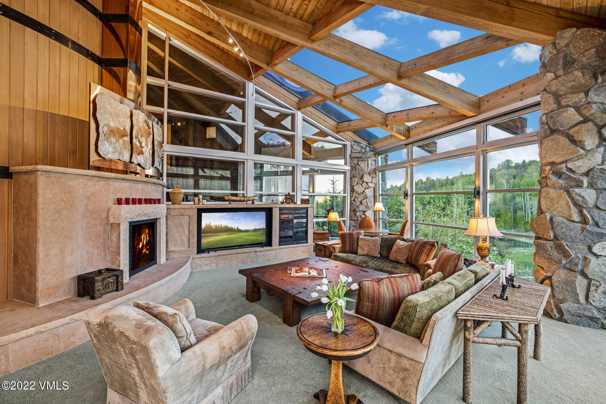 25 Casteel Creek Road Edwards, CO 81632 - Photo 58 of 87 a living room with fireplace furniture and a large window
