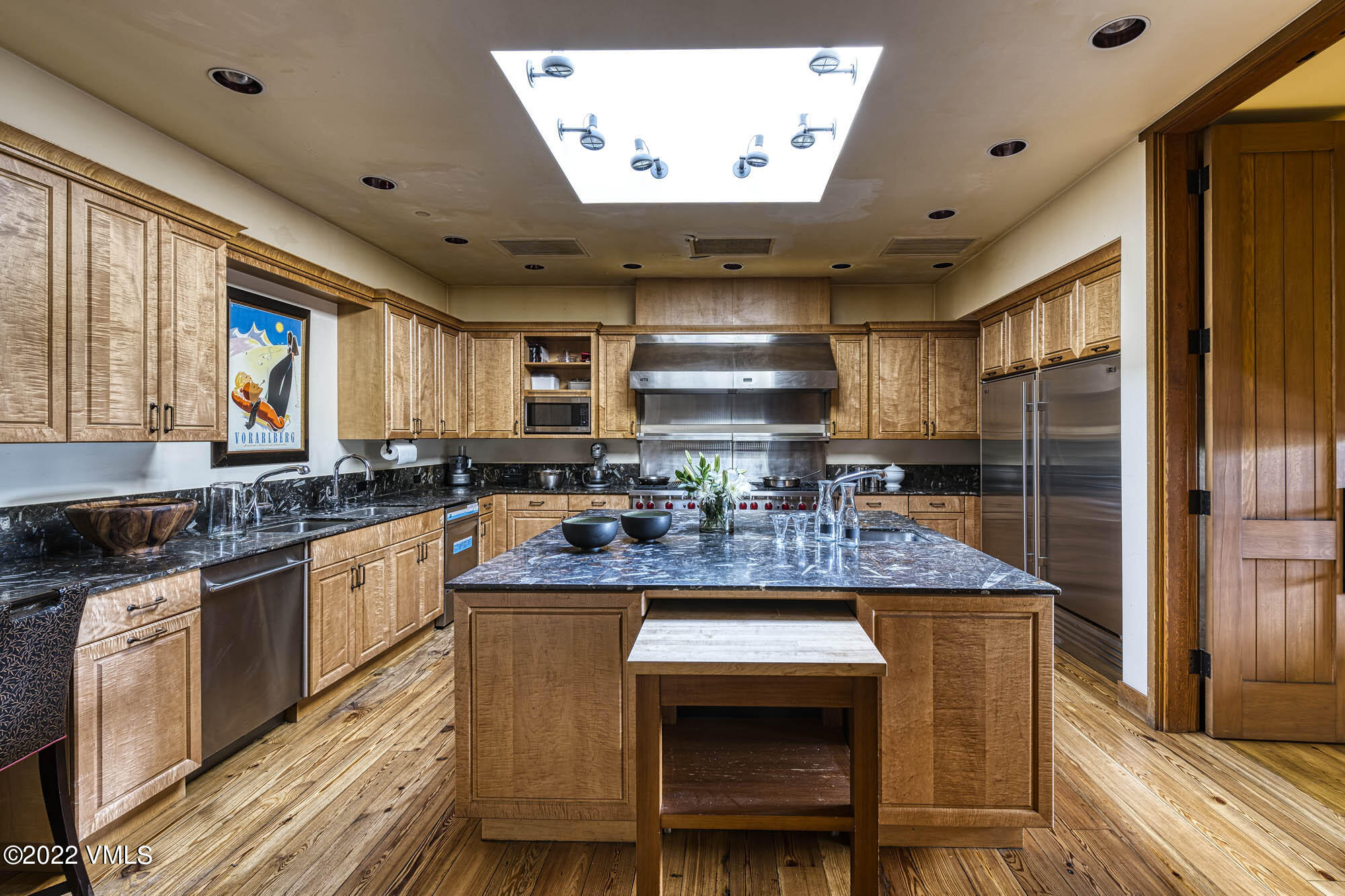 25 Casteel Creek Road Edwards, CO 81632 - Photo 60 of 87 a kitchen with stainless steel appliances granite countertop a sink stove and refrigerator