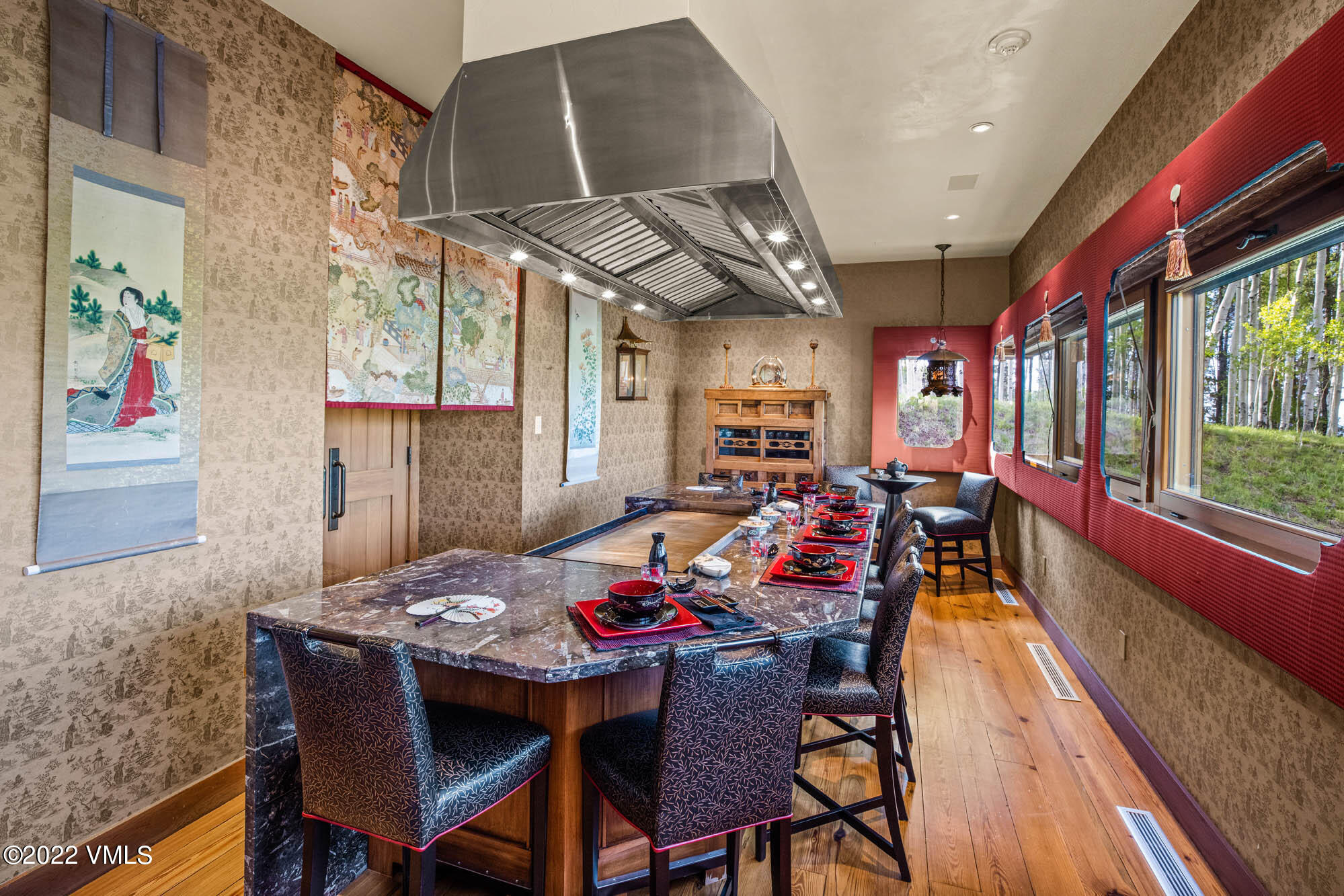 25 Casteel Creek Road Edwards, CO 81632 - Photo 61 of 87 a view of a dining room with furniture window and wooden floor