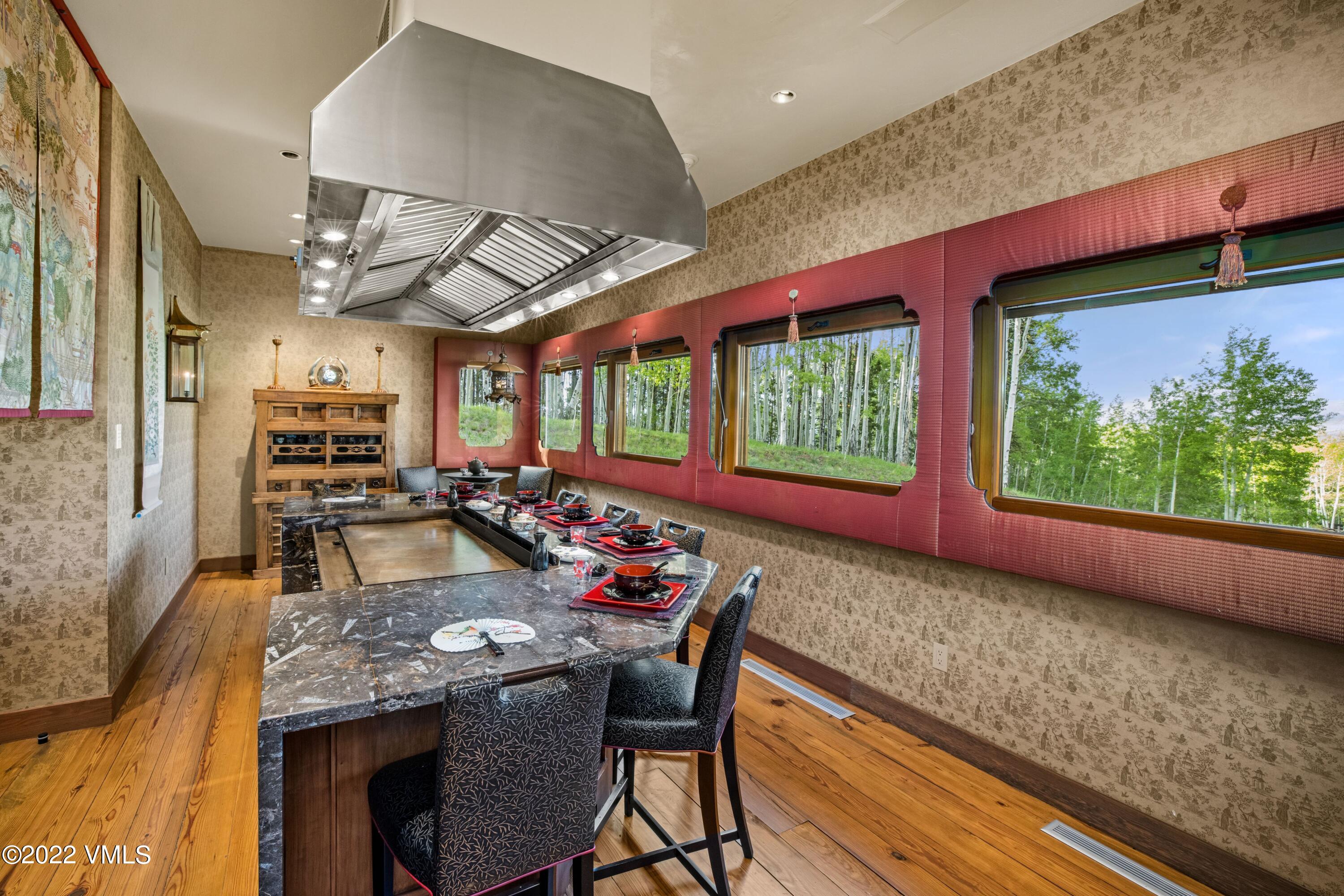 25 Casteel Creek Road Edwards, CO 81632 - Photo 62 of 87 a view of a dining room with furniture a rug and a large window