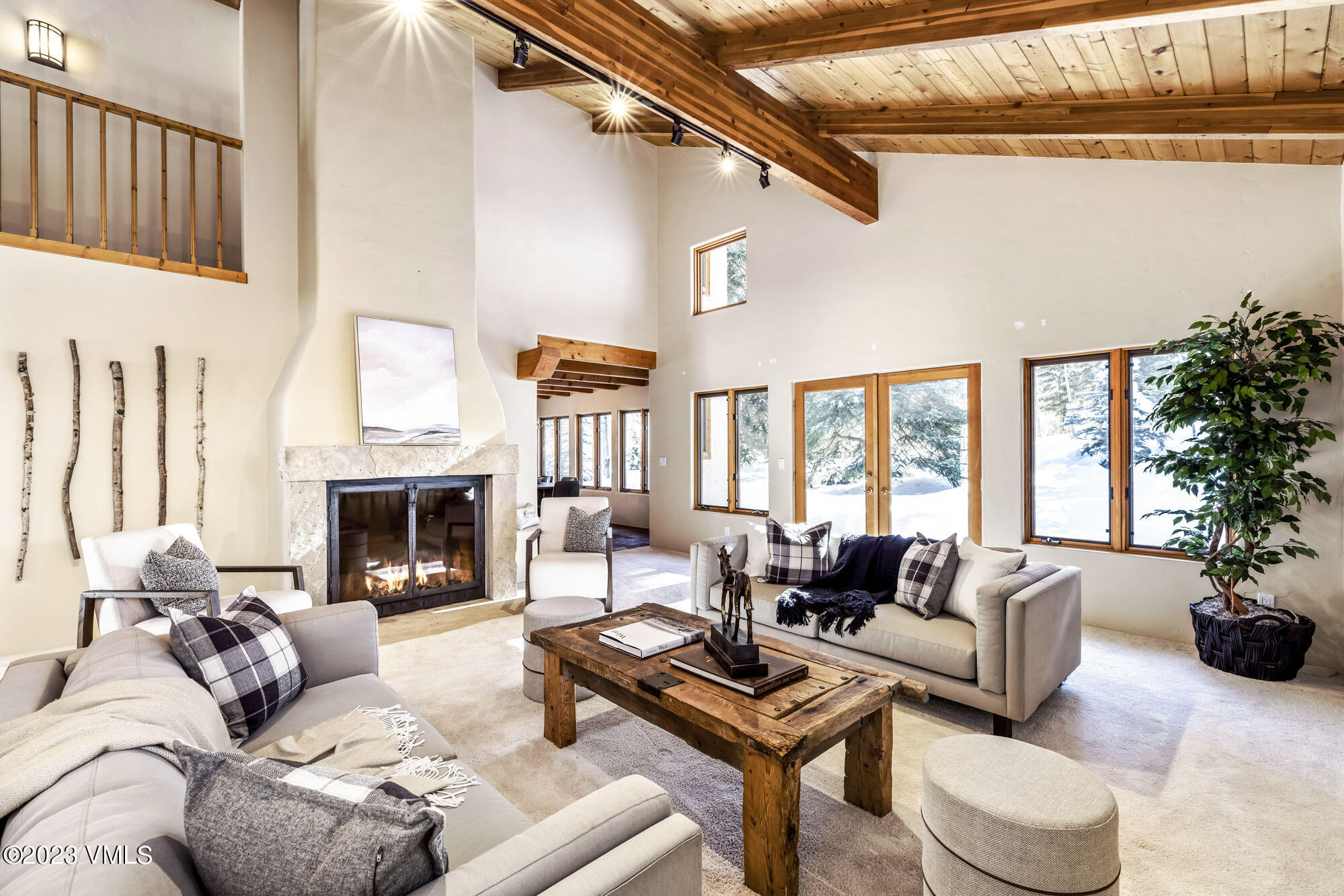 25 Casteel Creek Road Edwards, CO 81632 - Photo 7 of 87 a living room with furniture fireplace and a potted plant