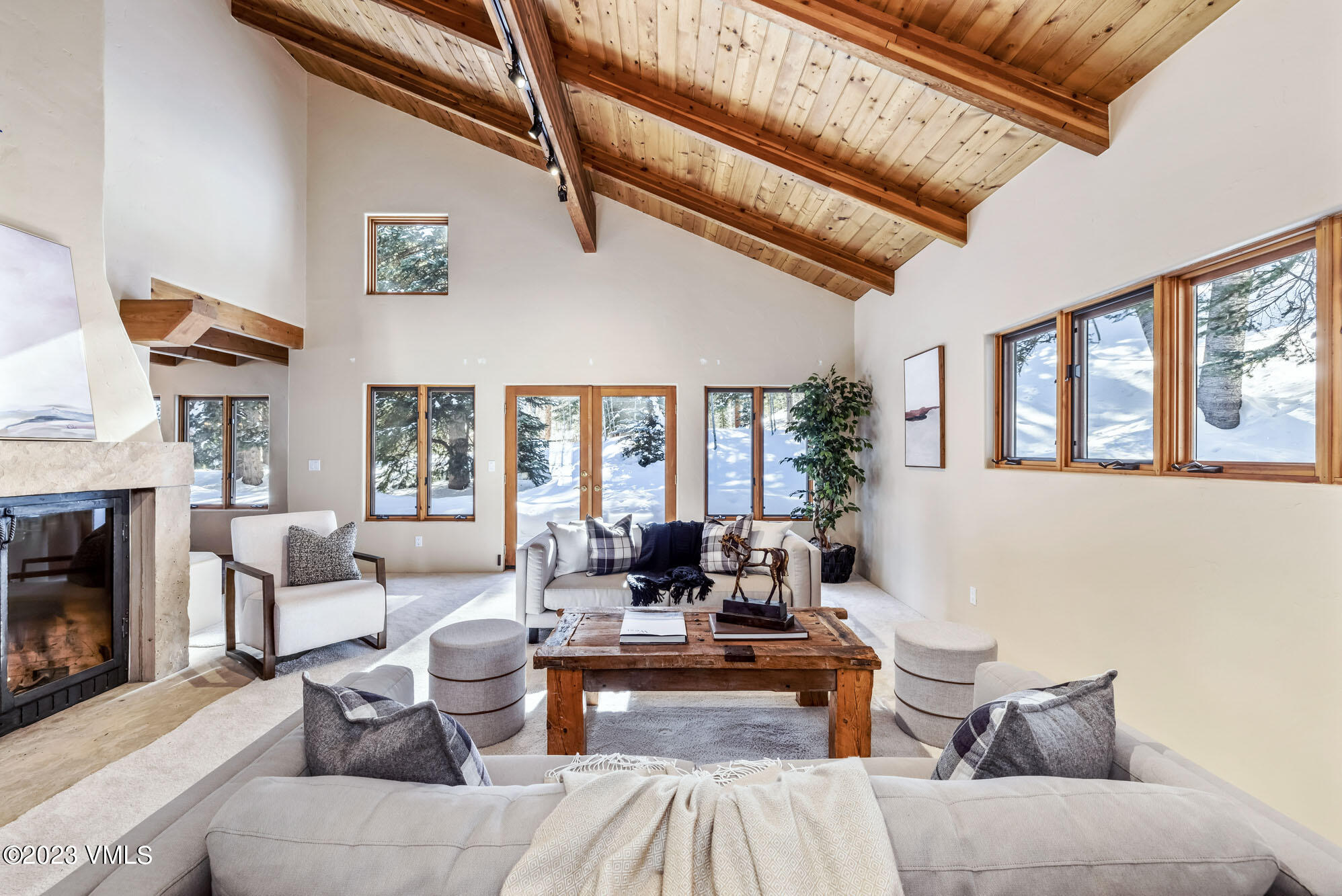 25 Casteel Creek Road Edwards, CO 81632 - Photo 8 of 87 a living room with furniture large window and fireplace