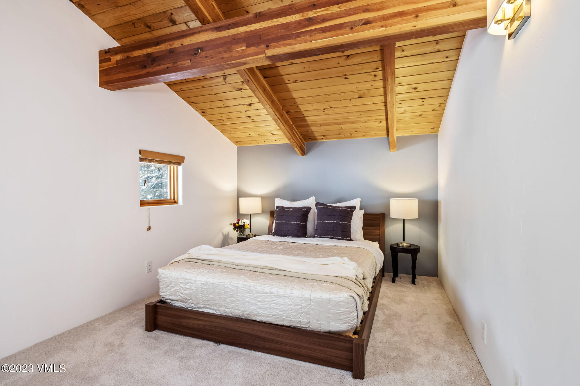 25 Casteel Creek Road Edwards, CO 81632 - Photo 87 of 87 a bedroom with a bed and a wall painting
