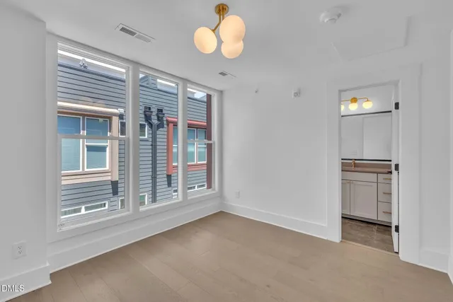 an empty room with windows