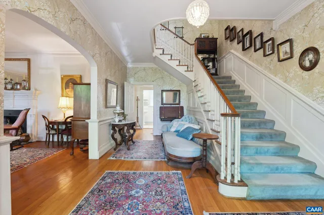 a view of a livingroom with furniture and windows