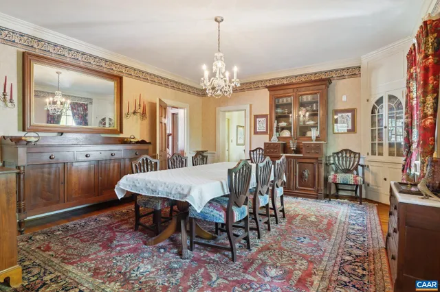 a bedroom with a bed and a chair