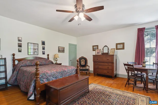 a front view of a house with large windows