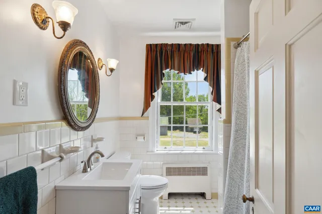 a backyard of a house with barbeque oven