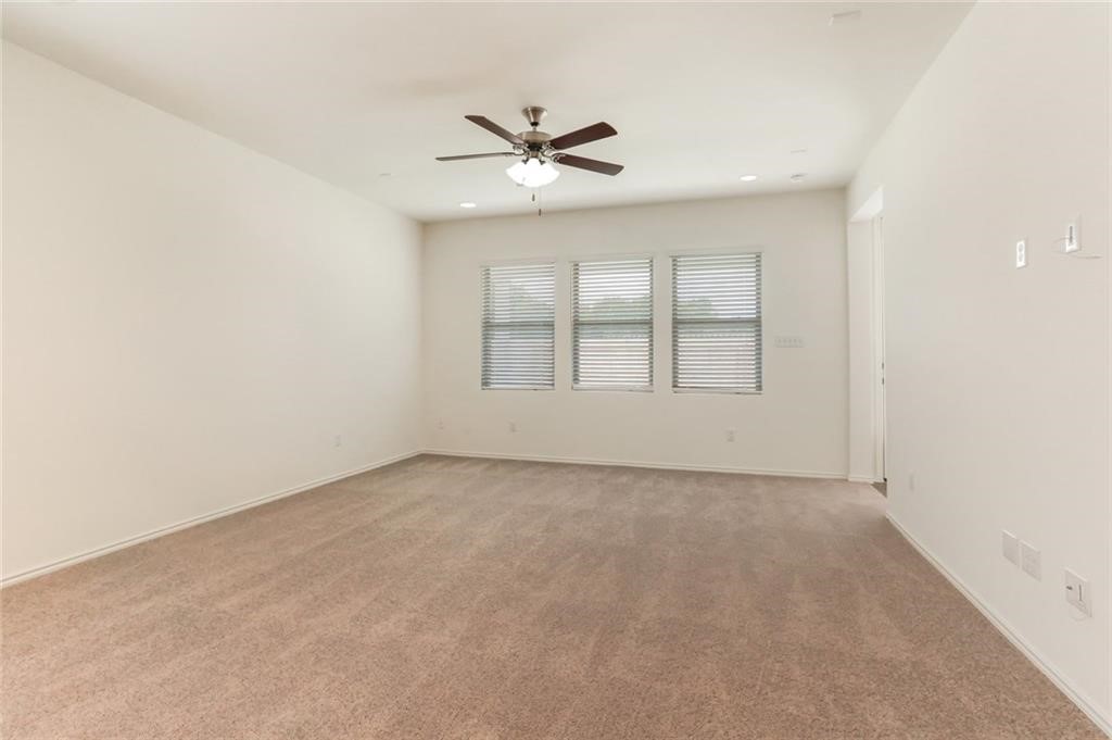 2233 Ringstaff Road Leander, TX 78641 - Photo 6 of 18 a view of an empty room with a window