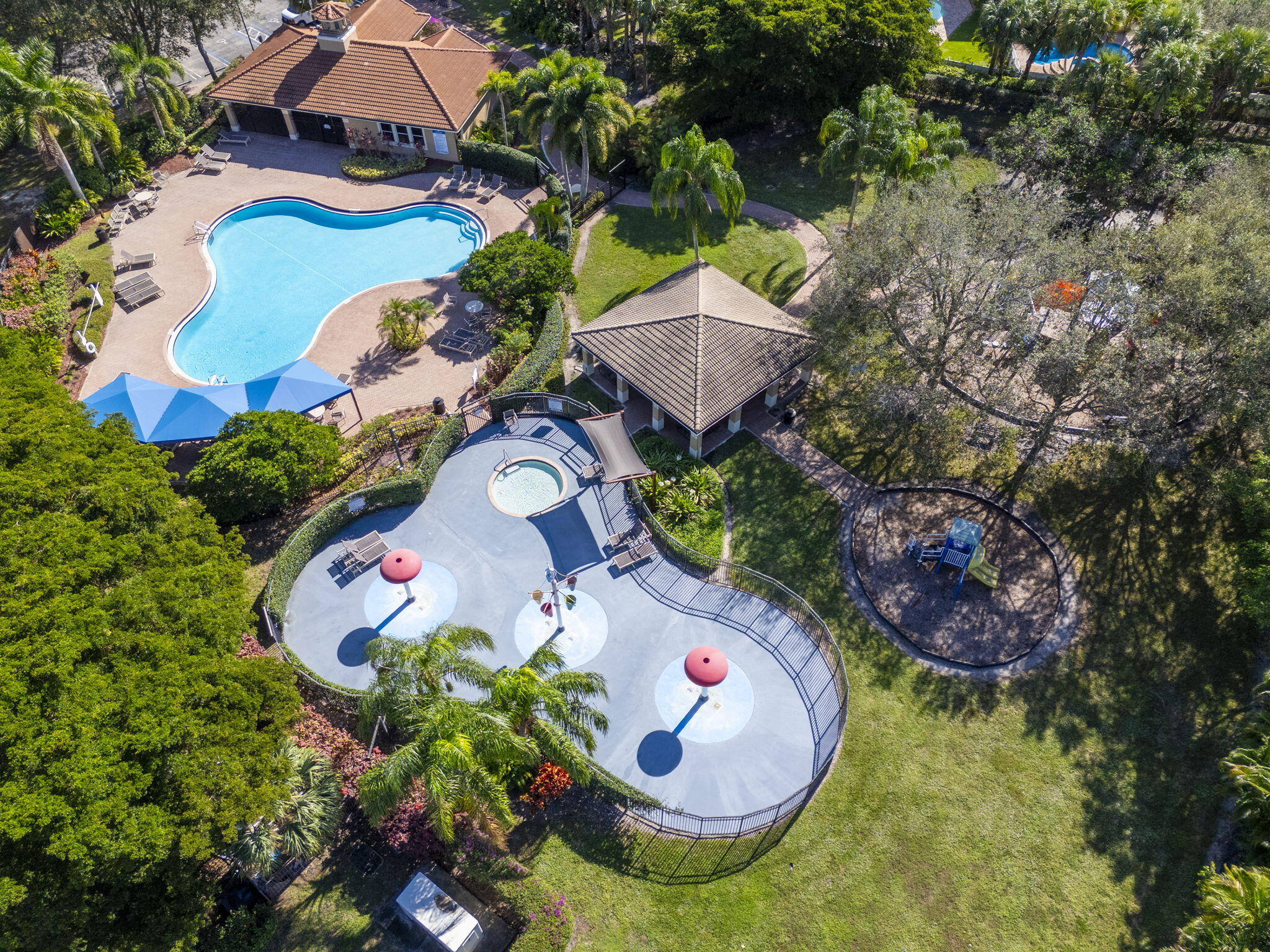 5033 Solar Point Drive Greenacres, FL 33463 - Photo 27 of 29 65-web-or-mls-DJI_20251212124224_0493_D