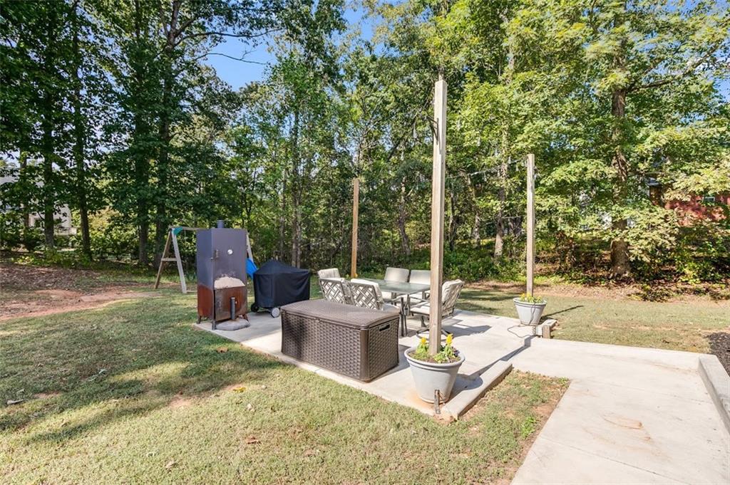 52 Castleman Road Carrollton, GA 30116 - Photo 24 of 35 swimming pool view with a seating space