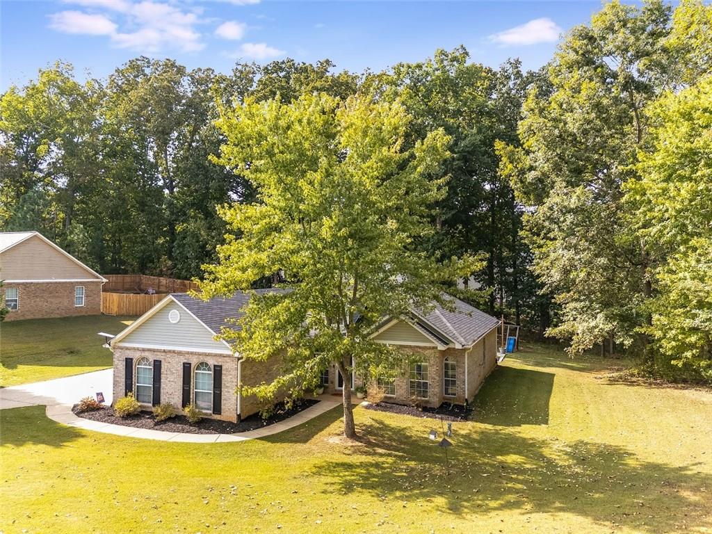 52 Castleman Road Carrollton, GA 30116 - Photo 28 of 35 a front view of a house with a yard