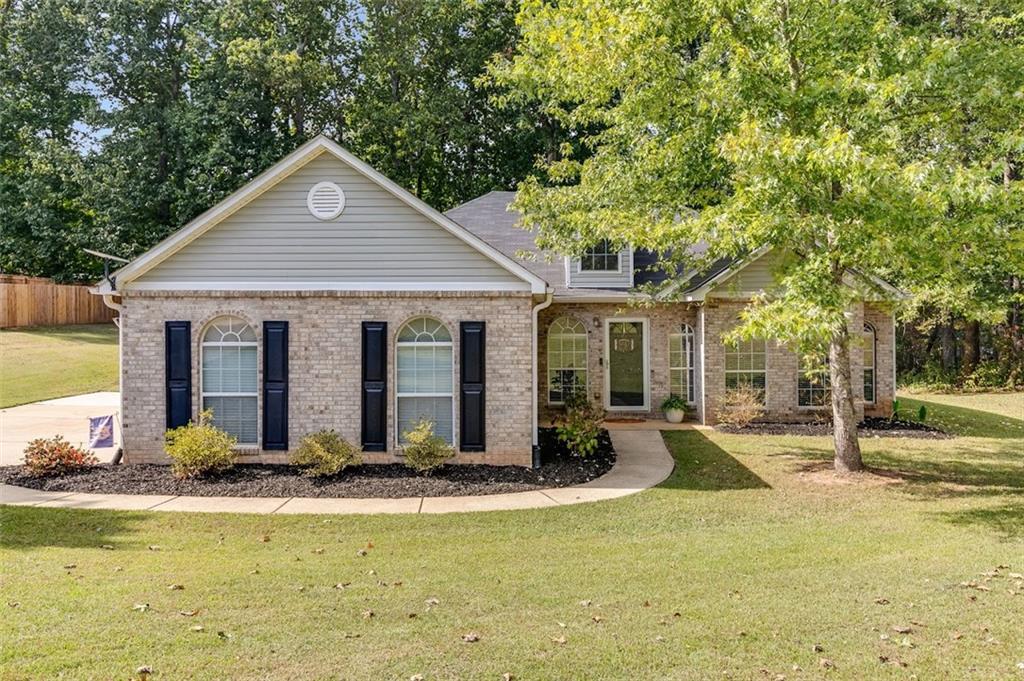 52 Castleman Road Carrollton, GA 30116 - Photo 9 of 35 a front view of a house with swimming pool