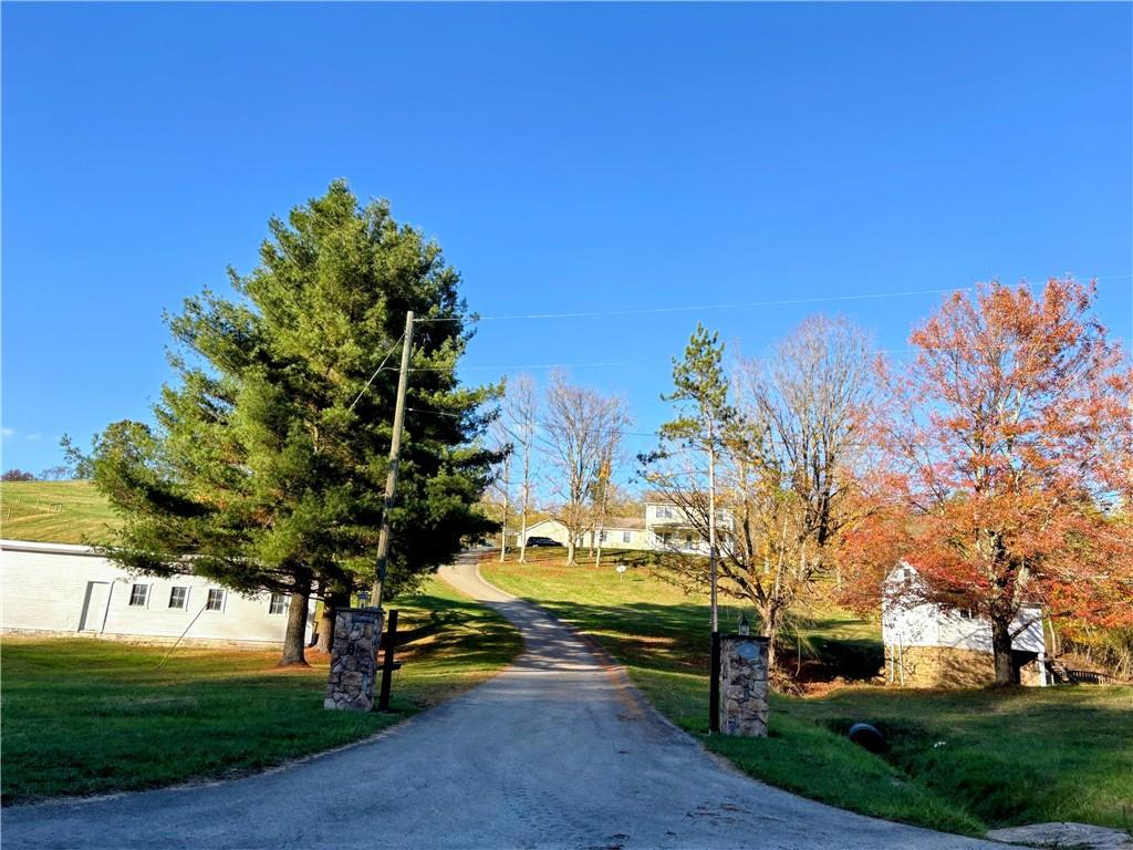 241 Lyons Road Claysville, PA 15323 - Photo 2 of 42 a view of a park with large trees