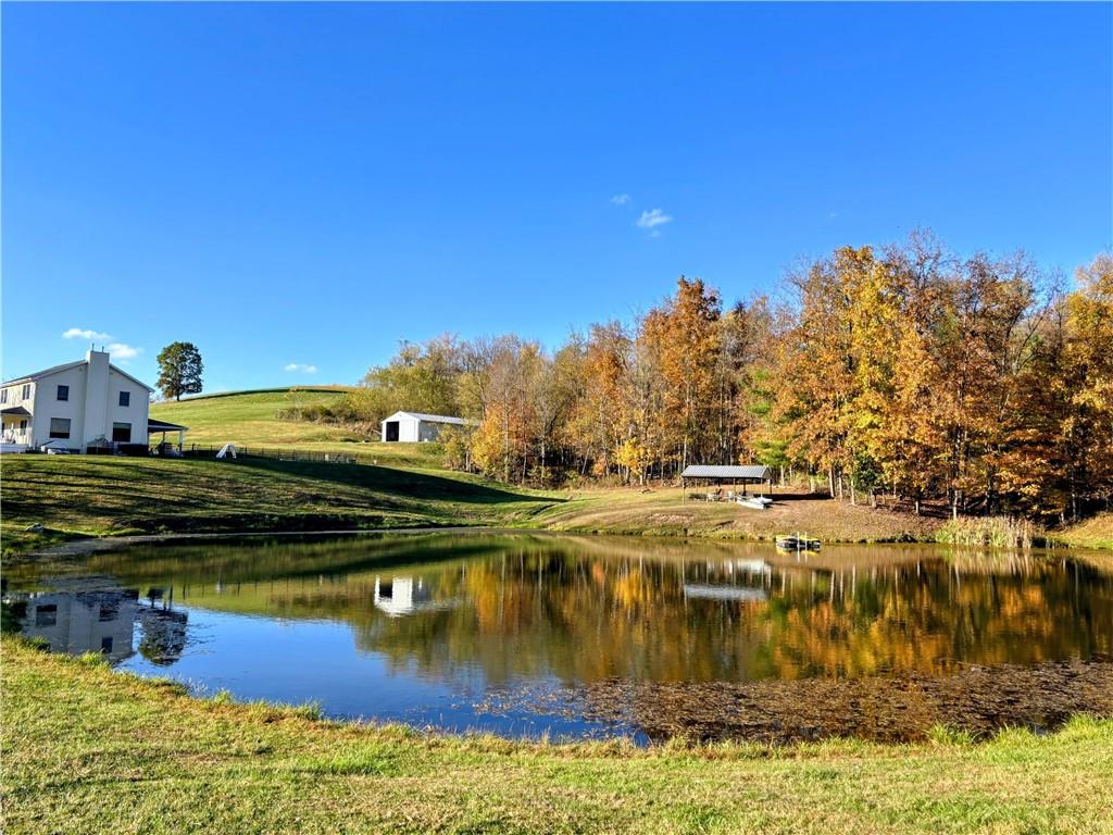 241 Lyons Road Claysville, PA 15323 - Photo 5 of 42 a view of a lake with houses