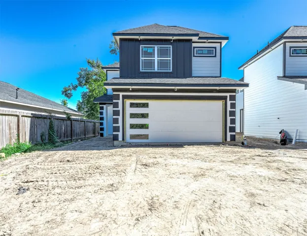 a house with trees in front of it