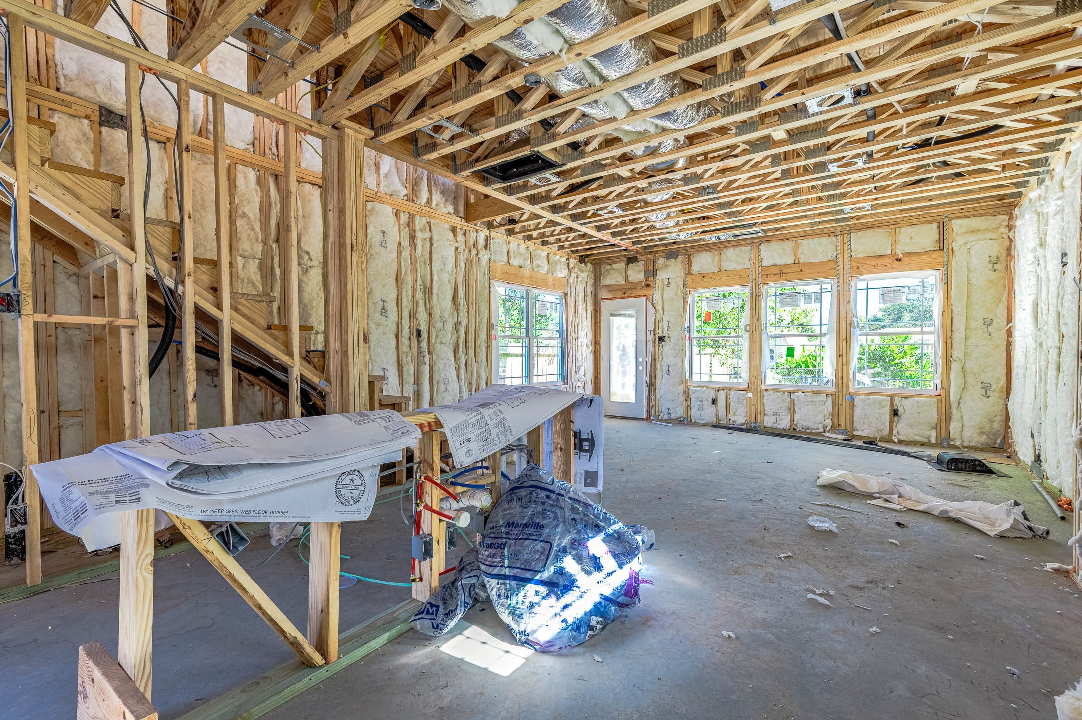 8602 Hoffman Street Houston, TX 77016 - Photo 4 of 7 a living room with furniture and a floor to ceiling window