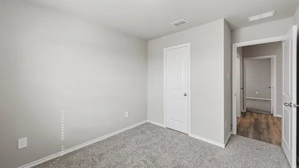 a bathroom with a bathtub and a toilet