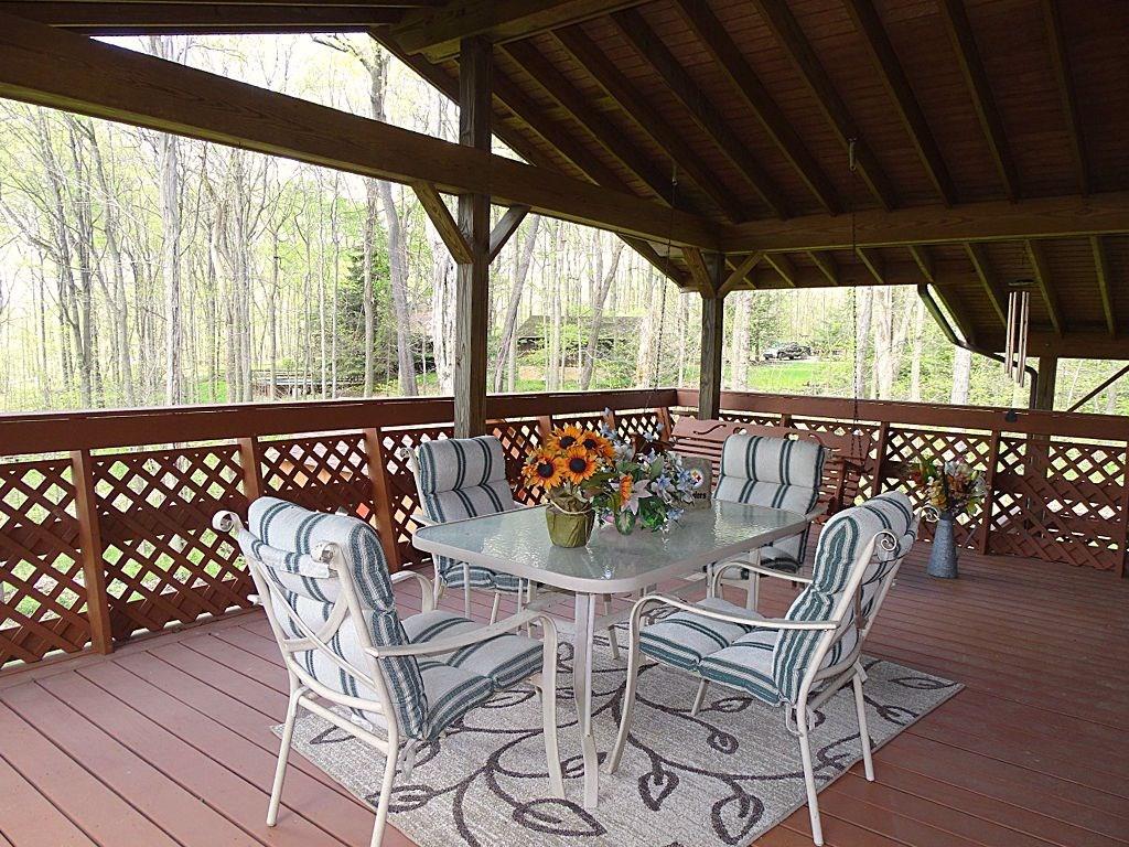 305 Linnwood Road Eighty Four, PA 15330 - Photo 19 of 25 Covered rear deck overlooks park-like rear property