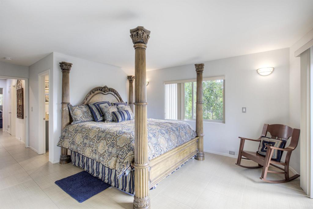 1773 Ivy Road Oceanside, CA 92054 - Photo 20 of 30 a bedroom with bed and a window