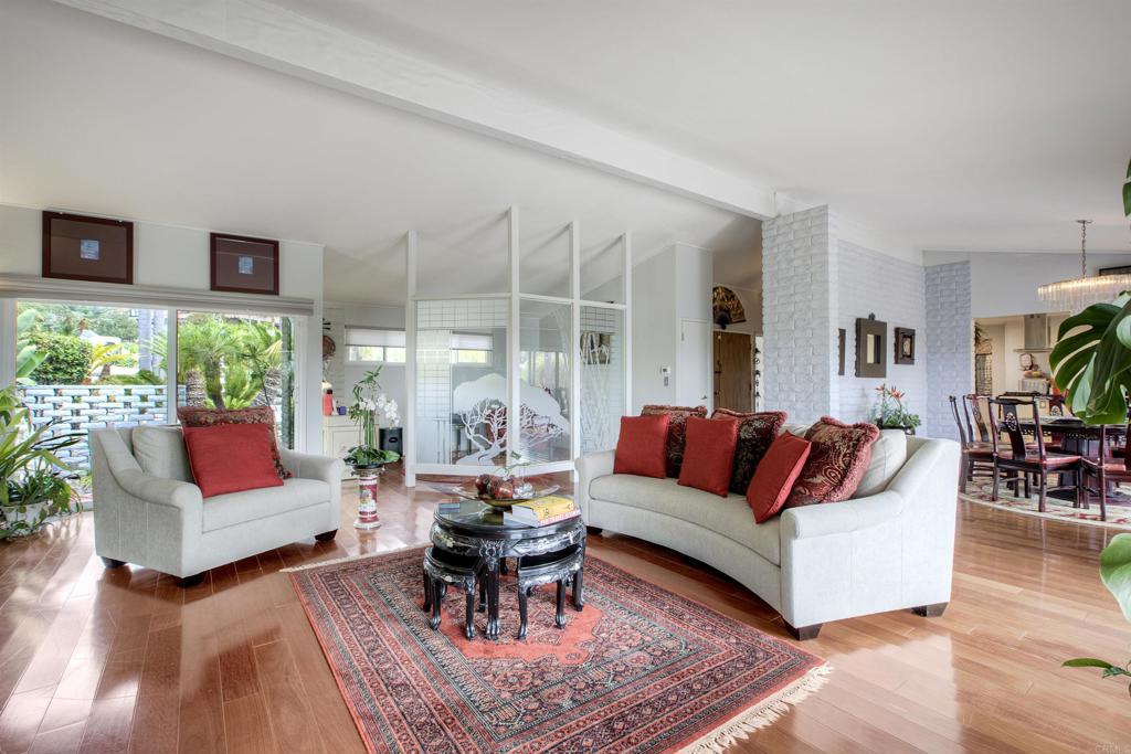 1773 Ivy Road Oceanside, CA 92054 - Photo 3 of 30 a living room with furniture and a large window