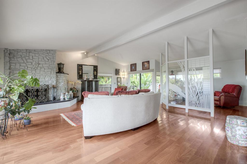 1773 Ivy Road Oceanside, CA 92054 - Photo 7 of 30 a living room with furniture and a large window