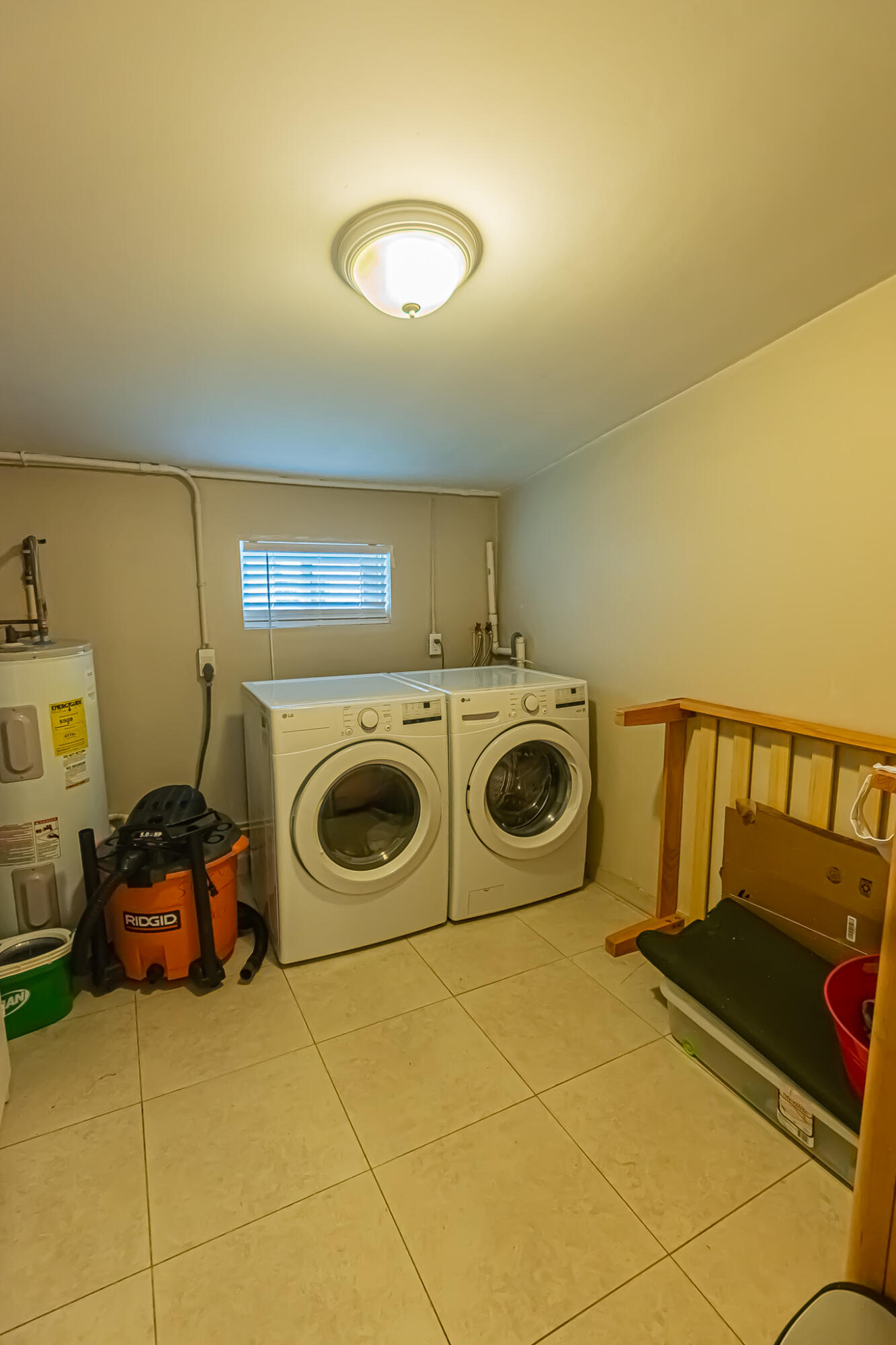 602 Azalea Avenue Fort Pierce, FL 34982 - Photo 12 of 20 a utility room with dryer and washer